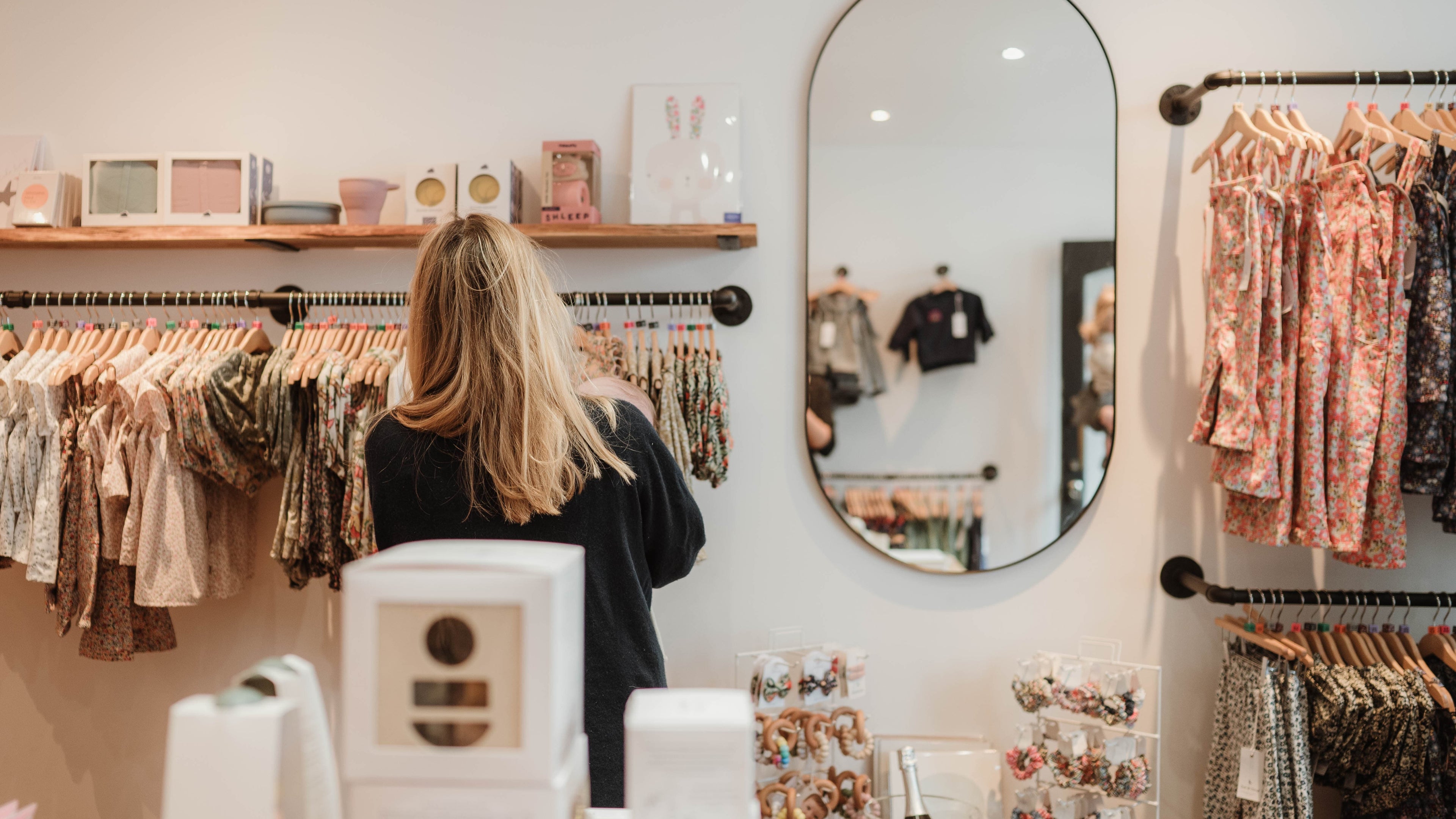 Dot & Doug Childrenswear in-store photo of lady shopping in the cotswolds